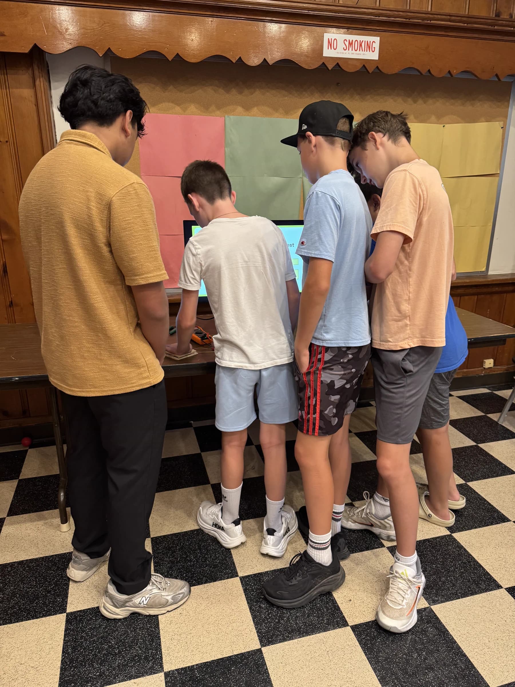 Vismay Patel guiding students through a hands-on clean-energy activity